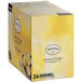 A yellow box of Twinings Lemon & Ginger Tea K-Cup Pods with a picture of lemon and ginger.