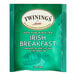 A green and white box of Twinings Irish Breakfast Tea Bags with black text.