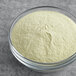 A bowl of Fanale Avocado powder mix on a table.