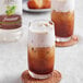 A glass of iced coffee with Monin Zero Calorie Natural Sweetener Syrup in it.