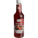 A Master of Mixes bottle of red liquid with a white cap and label.