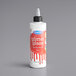 A white Satin Ice bottle of red vanilla glitter glaze with a red label and black cap.