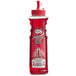 A case of 12 Master of Mixes grenadine syrup bottles on a counter. Each bottle is red with a red label and lid.