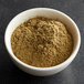 A white bowl filled with brown Regal Ground Sage powder.