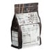 A brown bag of Callebaut Recipe 811 Dark Chocolate Callets with text and images.