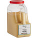 A white and yellow container of Regal ground English mustard seed.