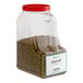 A plastic container of Regal rosemary leaves with a red lid.