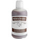 A bottle of Nielsen-Massey No Sugar Added Madagascar Bourbon Vanilla Extract with a white label.