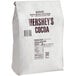 A white bag with black text that says "HERSHEY'S Natural Cocoa Powder"