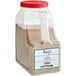 A plastic container of brown powder labeled "Regal Ultimate French Fry Seasoning" with a white lid.