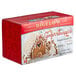 A white box of Bigelow Ginger Snappish Herbal Tea with a gingerbread house on it.