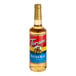 A Torani Butter Rum flavoring syrup 750 mL glass bottle.