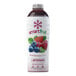 A bottle of Smartfruit Blooming Berry Puree with a label showing blooming berries.