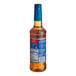 A Torani Sugar-Free Toasted Marshmallow flavoring syrup bottle with a blue label.