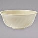A white bowl with a white rim on a gray background.