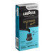 A blue and black box of Lavazza Espresso Maestro Dek decaf capsules for Nespresso machines.