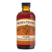 A Nielsen-Massey 4 fl. oz. bottle of Pure Chocolate Extract with a label.