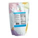 A white bag of Bossen Milk Snow Ice Powder with blue and pink text and a colorful design.