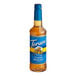 A Torani Sugar-Free Classic Hazelnut Flavoring Syrup plastic bottle with a blue label.