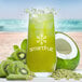 A glass of green Smartfruit Restore beverage with kiwi fruit garnish.