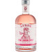 A case of 6 Lyre's Pink London Spirit gin bottles filled with pink liquid.