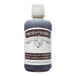 A bottle of Nielsen-Massey Madagascar Bourbon Vanilla Extract on a counter.