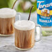 Two glass mugs of brown coffee with Torani Sugar-Free Vanilla syrup.