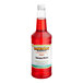 A close up of a 32 fl. oz. bottle of Hawaiian Shaved Ice Bahama Mama snow cone syrup with a red label.