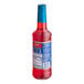 A red plastic bottle of Torani Sugar-Free Cherry Flavoring Syrup with a blue label.