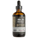 An 18.21 Bitters bottle with a label on a table.