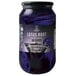 A blue jar of Wild Hibiscus Lotus Root in Butterfly Pea and Elderflower Syrup with a label.