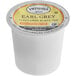 A white Twinings container with a yellow and black label for 24 Earl Grey decaffeinated K-Cup pods.