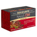 A white box of Bigelow Spiced Chai Tea Bags with a red and black label.