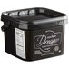 A black container of Satin Ice Dream Onyx Black chocolate-flavored rolled fondant with white text on the label.