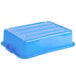 A Vollrath blue plastic bus tub with a lid.
