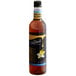 A close up of a DaVinci Gourmet Sugar Free French Vanilla flavoring syrup bottle with a white label.
