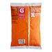 A bag of orange Gatorade sports drink powder on a white background.