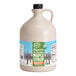 A jug of Butternut Mountain Farm organic maple syrup with a label.
