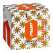 A white box with orange and white designs of Optimist Botanicals Non-Alcoholic Cali Spritz 4-Packs on a table.