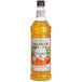 A Monin bottle of pumpkin pie flavoring syrup.