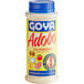 A white Goya bottle of Adobo All-Purpose Seasoning with a yellow label and blue lid.