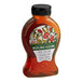 A case of 6 Dutch Gold 1 lb. bottles of wildflower honey with black caps and labels.