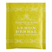 A yellow Harney & Sons Lemon Herbal Tea bag packet.