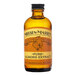 A Nielsen-Massey Pure Almond Extract bottle on a counter.