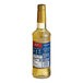 A Torani English Toffee flavoring syrup plastic bottle with a blue label.