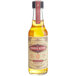 A close up of a 5 fl. oz. bottle of Scrappy's Bitters Grapefruit Bitters with a label on a white background.