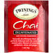 A red and white box of Twinings Decaffeinated Chai Tea Bags.