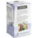 A white box of Numi Organic De-Stress Herbal Tea Bags with a label.