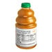 A close up of a bottle of Dr. Smoothie 100% Crushed Peach Pear Apricot fruit smoothie mix with a green cap.