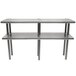 A stainless steel Advance Tabco double deck overshelf on a table.